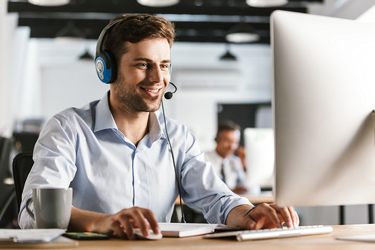 photo-young-worker-man-20s-wearing-office-clothes-headset-smiling-talking-with-clients-call-center